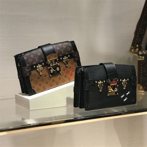 louis vuitton trunk clutch|Louis Vuitton hard case bag.